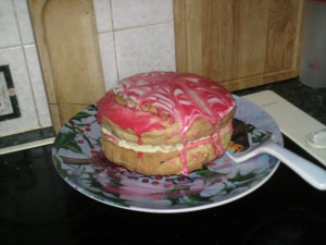 It's got lemon curd and butter cream in the middle, icing on top.